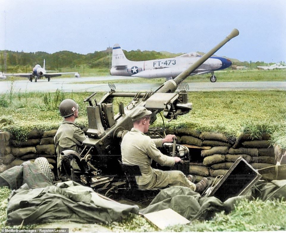 6698-6482847-US_soldiers_man_the_guns_THE_HORRORS_of_the_Korean_War_have_been-m-42_1544522094439.jpg