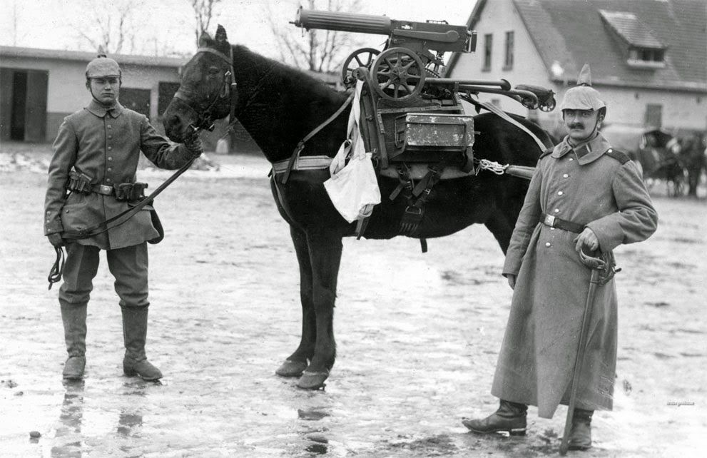 German Soldiers Pose with Horse Mounted with a Captured Machine Gun during WWI.jpg