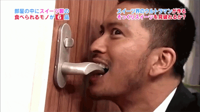japan-guy-biting-door-handle-139746933.gif