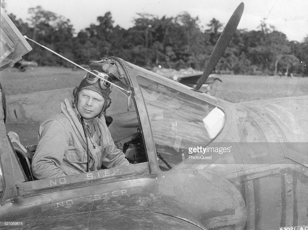 portrait-of-american-pilot-lt-richard-i-bong-in-cockpit-of-his-p38-picture-id521059874.jpg