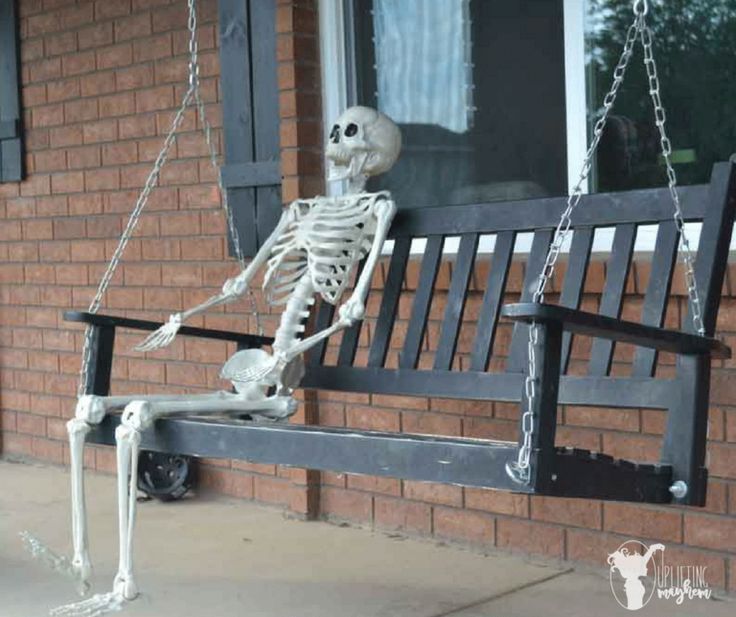 skeleton on porch swing.jpg