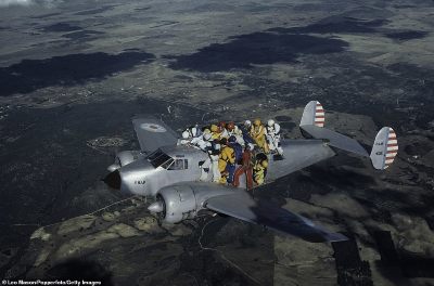 636-7584287-A_group_of_skydivers_holding_on_the_exterior_of_an_aeroplane_as_-a-261_1571411217388.jpg