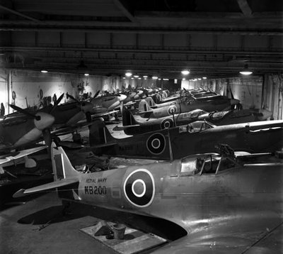 Non-folding-Seafire-IBs-and-IICs-stowed-within-HMS-INDOMITABLEs-hangar-in-1943..jpg