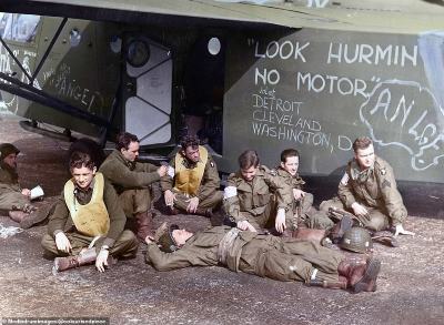 63052-8050709-American_Troops_of_the_101st_Airborne_Division_relax_beside_thei-a-7_1582801903037.jpg