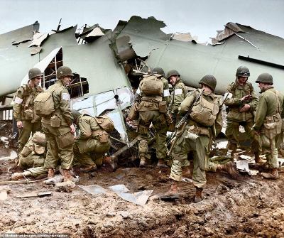 3082-8050709-American_Airborne_Troops_of_the_101_Airborne_Division_probably_5-a-29_1582796954303.jpg