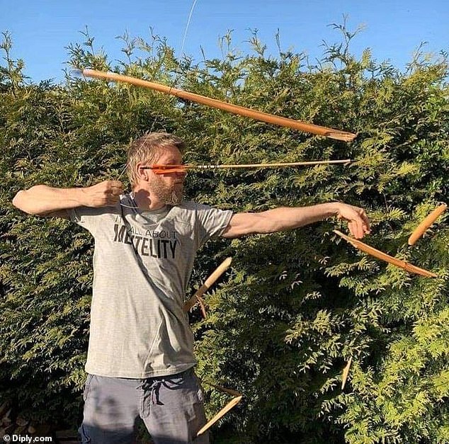 33622156-8773291-This_man_was_photographed_trying_o_shoot_his_bow_and_the_picture-a-80_1601048850402.jpg